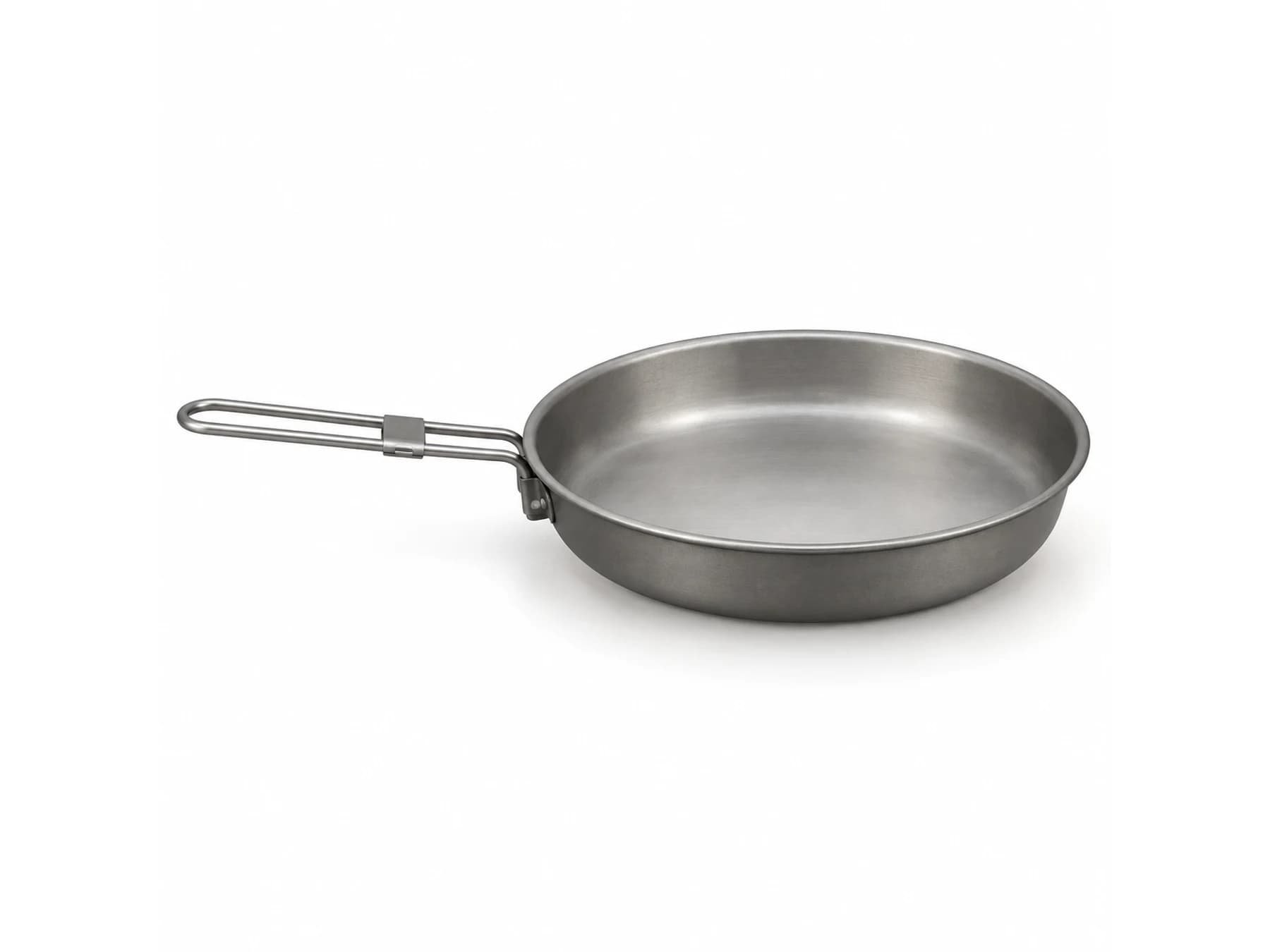 Titanium frying pan being used over a camp stove for OEM product development